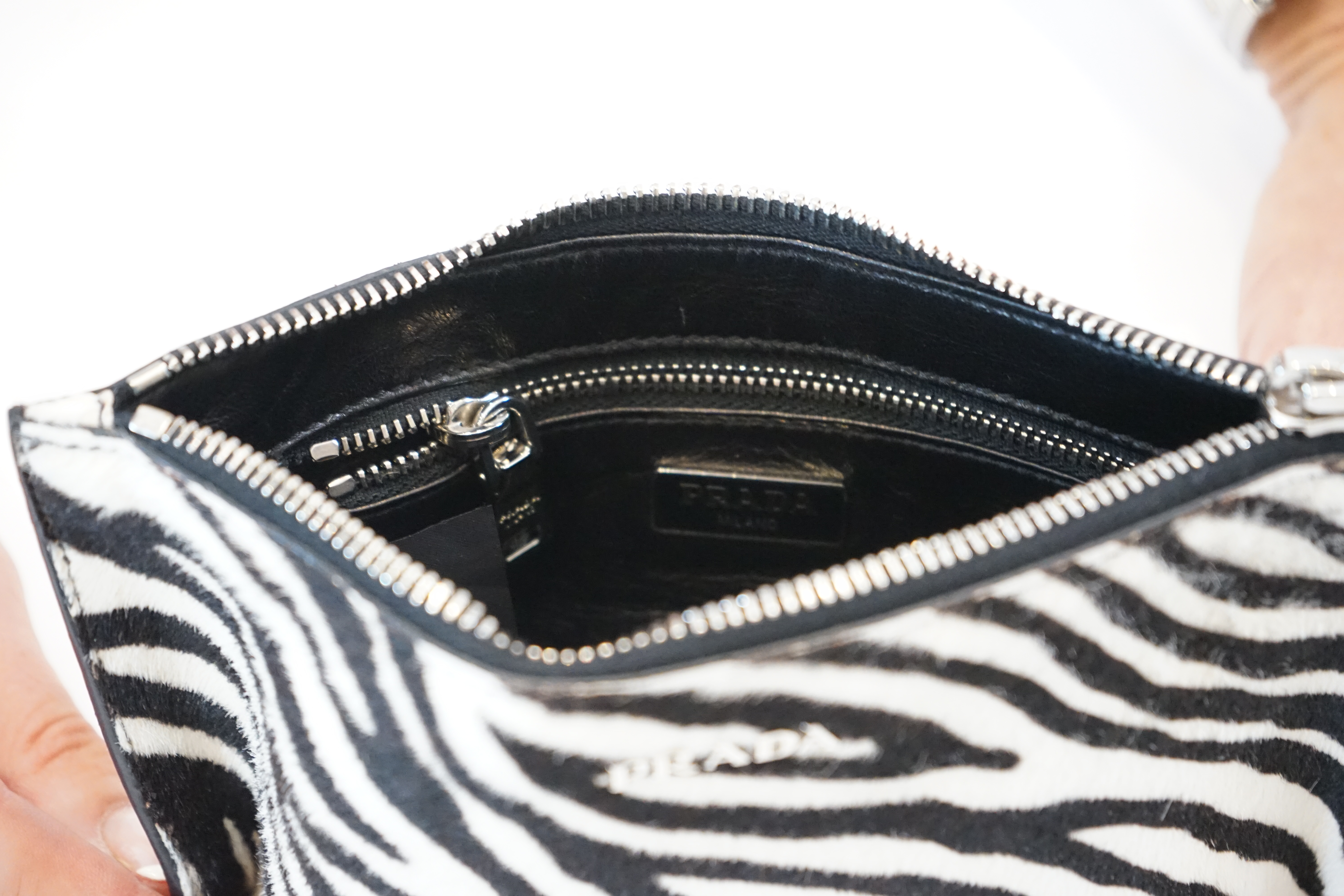 A Prada zebra print pony skin purse bag, width 21cm, height 13cm